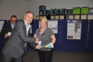 Head of School handing in the "Thank You" Certificates for Helpers and the Admin Team.